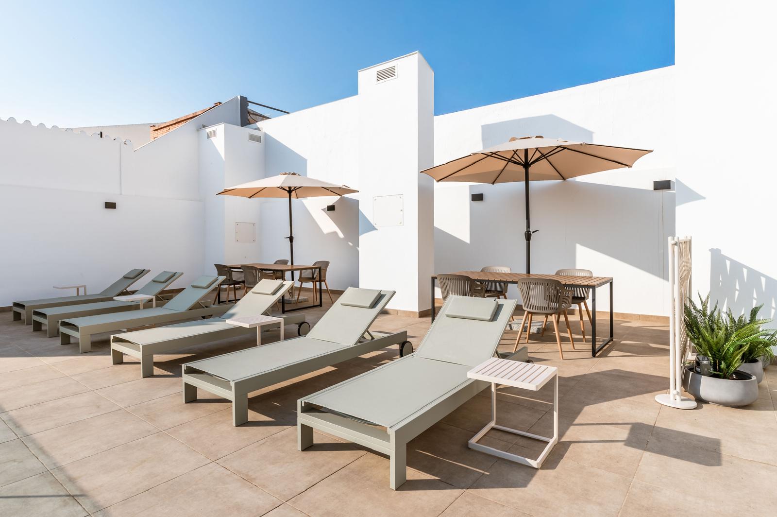 Detalle de los sillones de la terraza de Cauce4